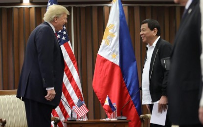 <p><strong>GOOD LEADER.</strong> President Rodrigo Roa Duterte and US President Donald Trump share a light moment prior to the bilateral meeting at the Philippine International Convention Center in Pasay City on November 13, 2017. Duterte said Trump’s comment on the Visiting Forces Agreement termination makes the latter a ‘good’ leader. <em>(Presidential photo by Robinson Niñal)</em></p>