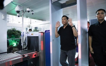 <p><strong>SURPRISE INSPECTION.</strong> President Rodrigo Roa Duterte submits himself for security checkup as he makes a surprise inspection at the Ninoy Aquino International Airport (NAIA) Terminal 2 in Pasay City on June 10, 2019. Duterte inspected the premises for about 20 to 30 minutes and apologized to passengers affected by flight cancellations and delays. <em>(Alfred Frias/Presidential Photo)</em></p>