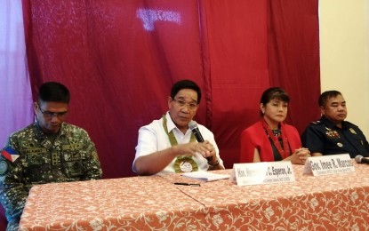<p><strong>REGIONAL TASK FORCE TO FIGHT INSURGENCY. </strong>National Security Adviser Secretary Hermogenes Esperon Jr. (second from left) leads the launching of the Regional Task Force to End Local Communist Armed Conflict during the meeting of the Regional Peace and Order Council (RPOC) chaired by Ilocos Norte Governor and Senator-elect Imee Marcos (second from right) and the Regional Development Council (RDC) at Bauang La Union. <em>(Photo by Liwayway Yparraguirre) </em></p>