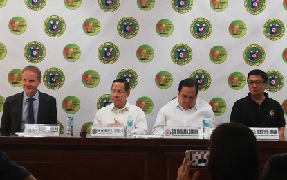 <p>Health Secretary Francisco Duque III (2nd from left) during a press conference on Tuesday. <em>(Photo by Ma. Teresa Montemayor)</em></p>