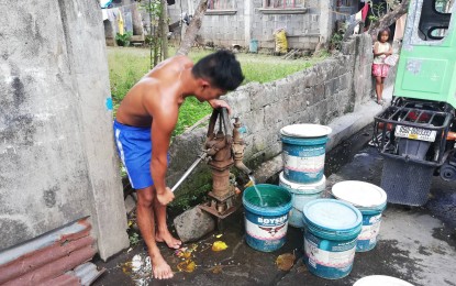 <p><strong>WATER SHORTAGE.</strong>  Almost a month now, residence of Barangay Rizal in Oas town in Albay suffers water shortage. They need to put water into drums and pails just to save water from deep well. <em>(PNA photo By Connie Calipay) </em></p>