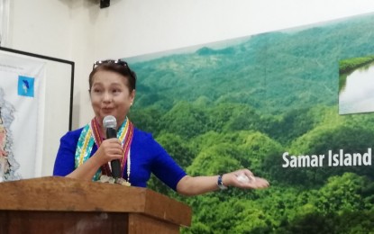<p><strong>ADDRESSING THE PEOPLE. </strong> Speaker Gloria Macapagal-Arroyo addresses the people's organization at the Samar Island National Park office in Paranas, Samar on Friday (June 14, 2019).With just two weeks left before stepping down as House Speaker, Arroyo said she wants to see how the 212-km. road project in Samar changed the lives of impoverished families. <em>(PNA photo by Sarwell Q. Meniano)</em></p>