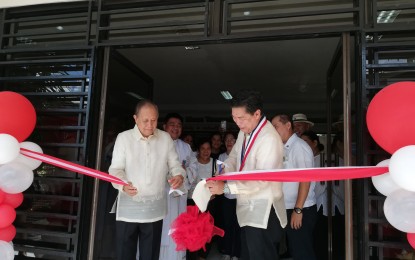 <p><strong>OPEN FOR MARRIAGE COUNSELLING.</strong> Iloilo Governor Arthur Defensor, Sr. (left) opens on Wednesday (June 12, 2019) the Multi-Purpose Counseling and Family Development Center in Santa Barbara with Town Mayor Dennis Superficial. The center will be a space for pre-marriage counseling sessions.<em> (PNA photo by Gail Momblan)</em></p>