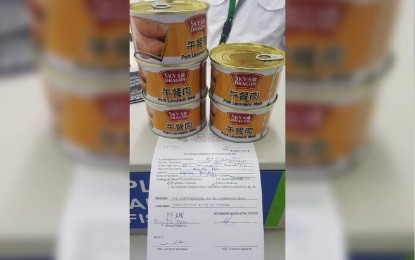 <p><strong>INFECTED PORK. </strong>Cans of Sky Dragon brand pork luncheon meat were confiscated from a returning resident at the Clark International Airport on March 25, 2019. It was later tested and found to be infected with the African Swine Fever virus. (<em>Photo from DA Secretary Emmanuel Piñol’s FB page</em>)</p>
<p> </p>