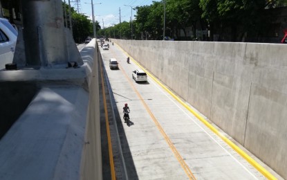 <p><strong>CEBU CITY  UNDERPASS.</strong> First few motorists drive through the PHP638-million underpass project which has been opened to traffic on Saturday (June 15, 2019). The Department of Public Works and Highways (DPWH-7) opted to have a simple blessing by a Catholic priest before the structure was opened to motorists, pending inspection and formal inauguration, with the aim of easing traffic congestion in the area in time with the class opening season. <em>(Photo by John Rey Saavedra)</em></p>