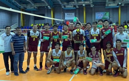 <p><strong>CHAMPION AGAIN. </strong> Members of Perpetual Junior Altas volleyball team pose for a photo opportunity after winning their second straight title in the Imus Volleyball League inter-secondary invitational division title at Imus Sports Complex in Imus on June 15.  Perpetual, the five-peat champion of the National Collegiate Athletic Association (NCAA), defeated De La Salle-Zobel, 25-20, 25-18, 20-25, 25-19, in the finals. <em>(PNA photo by Dennis Abrina)</em></p>