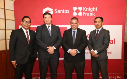 <p><strong>REAL ESTATE INDUSTRY EVOLUTION:</strong> Rick Santos <em>(2nd from left)</em> Chair and CEO of Santos Knight Frank, predicts the Real estate Investment Trust (REIT) will soon be the business model defining the real estate sector. It is seen to give smaller investors the opportunity to invest in high-value real estate assets along with the big players. <em>(PNA photo by Christine Cudis)</em></p>
