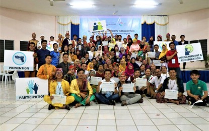 <p><strong>BARMM YOUTH EMPOWERMENT. </strong> Over 100 youth leaders from the Bangsamoro Autonomous Region in Muslim Mindanao (BARMM) pose for a photo opportunity after attending the Youth, Peace and Security consultation in Datu Odin Sinsuat, Maguindanao over the weekend. The youth leaders crafted a five-point youth peace and security agenda during the consultation organized by the Office of the Presidential Adviser on the Peace Process. <em>(Photo courtesy of OPAPP)</em></p>