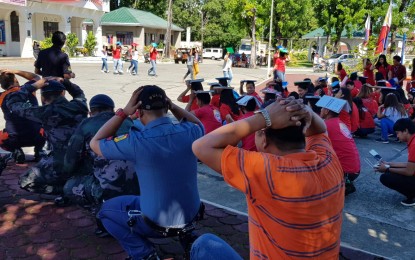 <p><strong>QUARTERLY TRAINING.</strong> Police personnel, municipal employees, and students join the second quarter National Simultaneous Earthquake Drill in Ilocos Norte on Thursday (June 20,2019). The quarterly drill aims to educate residents to reduce casualties during earthquakes. <em>(Photo courtesy of the Solsona Municipal Police Station)</em></p>