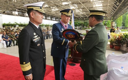 <p><strong>CHANGE-OF-COMMAND AND RETIREMENT RITES. </strong>AFP Chief-of-Staff, Gen. Benjamin Madrigal (right), leads the joint ceremony for the retirement of vice chief-of-staff Lt. Gen. Salvador B. Mison (center). Replacing Mison is AFP Deputy Chief of Staff, Vice Admiral Gaudencio Collado Jr. (left). <em>(Photo courtesy: AFP Public Affairs Office)</em></p>