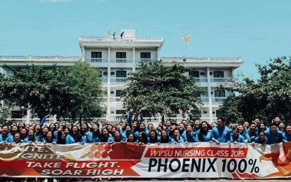 <p><strong>100% PASSING RATE.</strong> The 2019 nursing graduates of the West Visayas State University (WVSU)-La Paz Campus, in La Paz district in Iloilo City secure a 100 percent passing rate in the Nursing Licensure Examination this month. Twelve of its graduates made it to the top 10 examinees out of the 5,059 passers, according to the Professional Regulation Commission. <em>(Photo courtesy of Julleon Anasarias)</em></p>