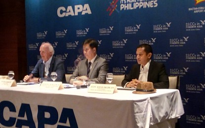 <p><strong>CAPA SUMMIT</strong>. Centre for Asia-Pacific Aviation (CAPA) chairman emeritus Peter Harbison (left), Tourism Undersecretary Benito Bengzon (center), and Mactan-Cebu International Airport Authority general manager Steve Dicdican spend time with the media during the opening of the CAPA Low-Cost Carriers (LCC) in North Asia Summit at Radisson Blu Hotel in Cebu on Monday, June 24, 2019. Harbison says LCCs are vital contributors to the increase of tourist arrivals in the Philippines, accounting for 41.9 percent of the international seat capacity. <em>(Photo by Luel Galarpe)</em></p>
