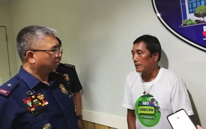 <p><strong>ARRESTED</strong>. Brig. Gen. John Bulalacao, regional director of Police Regional Office 6 (Western Visayas), on Monday, June 24, questions Baltasar Saldo, also known as Virgilio Paragan. Saldo, who is also a former commander of Roger Mahinay Command, Komiteng Rehiyon-Negros of the Communist Party of the Philippines-New People's Army, was arrested at Sto. Angel, Dumalag, Capiz on Sunday. <em>(PNA Photo by Gail Momblan)</em></p>