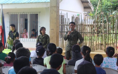 <p><strong>COMMUNITY VISIT.</strong> Soldiers talk with residents of a remote community in Lope de Vega, Northern Samar covered by the Philippine Army Community Support Program. In the first six months of 2019, the program has reached out to 100 remote communities in Eastern Visayas in the bid to fight the decades-long insurgency.<em> (Photo from FB page of Army 43rd Infantry Battalion)</em></p>