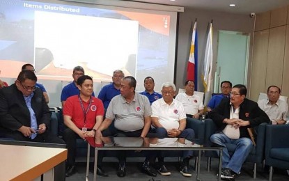 <p><strong>FREE TRAIN RIDE.</strong> Transportation Secretary Arthur Tugade (center, in gray) announces free rides for students taking the Light Rail Transit 2 (LRT-2), Metro Rail Transit 3 (MRT-3), and Philippine National Railways (PNR) at certain hours starting July 1, during the fourth "Transport Talks" held at the transportation department’s conference room in Clark, Pampanga on Thursday (June 27, 2019).  Terminal fees at seaports and airports owned and managed by the Civil Aviation Authority of the Philippines and Philippine Ports Authority have also been waived for students. <em>(Photo by Marna Dagumboy-del Rosario)</em></p>