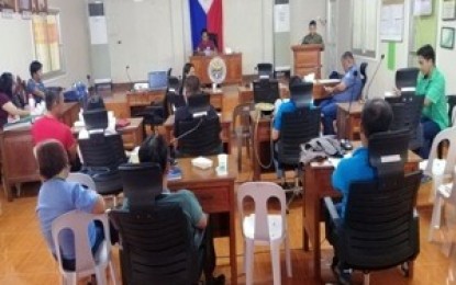 <p><strong>TERRORISTS UNWELCOME.</strong> The Municipal Peace and Order Council of Laur in Nueva Ecija province approves a resolution declaring the Communist Party of the Philippines - New People's Army (CPP-NPA) as “persona non grata” in its meeting held at the mayor’s office on Wednesday (June 26, 2019). The municipality of Maria Aurora in Aurora province likewise approved a similar resolution, bringing to four the total number of local government units in Central Luzon that have declared the communist organization as "unwelcome". <em>(Photo courtesy of the Municipal Peace and Order Council-Laur)</em></p>