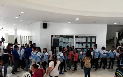 <p><strong>ILOILO WINNERS.</strong> Winning athletes during the Palarong Pambansa 2019 line up at the Treasurer's Office to claim their cash incentives on Thursday (June 27, 2019). The cash incentives are meant to recognize and encourage the athletes who brought pride to the province. <em>(PNA photo by Gail Momblan)</em></p>