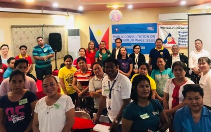 <p><strong>PAY DISCUSSIONS.  </strong>Members of the Regional Tripartite Wages and Productivity Board, employers, and workers take a photo together after a consultation on wage issue in Naval, Biliran on June 17, 2019.  Consultations in different provinces are still ongoing to find out if there’s a need to adjust the current wage structure for private sector workers in Eastern Visayas. <em>(Photo courtesy of RTWPB)</em></p>
<p> </p>