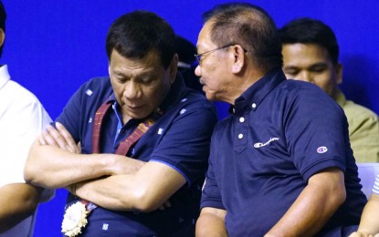 <p><strong>POINT MAN</strong>. President Rodrigo Roa Duterte chats with Agriculture Secretary Emmanuel Piñol on the sidelines of the distribution of Certificates of Land Ownership Award (CLOAs) to Agrarian Reform Beneficiaries (ARBs) at the Lagao Gymnasium in General Santos City on June 13, 2019.  Duterte on Thursday (July 11) said Bangsamoro Autonomous Region in Muslim Mindanao (BARMM) interim Chief Minister Al-Hajj Murad Ebrahim has accepted the proposal to designate Piñol as the “point man” to develop Mindanao. <em>(Presidential Photo)</em></p>