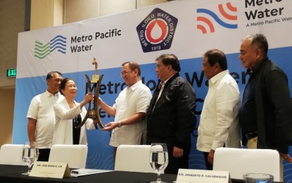 <div><strong>TAKE OVER.</strong> Metro Iloilo Water (MIW) takes over the water distribution system in Iloilo City and seven other towns of Iloilo province, effective July 1, 2019. MIW is a joint venture of the Metro Iloilo Water District (MIWD) and the Metro Pacific Water (MPW), which is the wholly-owned water infrastructure investment of the Metro Pacific Investments Corporation (MPIC). In photo, MIWD chairperson Jessica C. Salas (second from left) turns over the symbolic faucet to MPIC president and MIW director Jose Ma. K. Lim (3rd from left in a ceremony witnessed by (from left to right) MIWD Director Felix Tiu, Senator Franklin Drilon, MIW president Eriberto Calubaquib, and MIW chief operating officer Enrique Gita. <em>(PNA photo by PGLena)</em></div>
