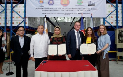 <p><strong>ASEAN RELIEF ITEMS WAREHOUSE. </strong>The ASEAN Coordinating Centre for Humanitarian Assistance on disaster management (AHA Centre) and Deutsche Post DHL (DPDHL) Group sign a Memorandum of Intent (MOI) to collaborate on emergency preparedness and disaster response. (From L-R) Arnel Capili, Deputy Executive Director of AHA Centre; Undersecretary Ricardo B. Jalad, Administrator of the Office of Civil Defense and Executive Director, National Disaster Risk Reduction and Management Council (NDRRMC) of the Philippines; Adelina Kamal, Executive Director of AHA Centre; Carl Schelfhaut, GoHelp Manager, Asia Pacific, DPDHL Group; Nurhayati Abdullah, Country Manager, DHL Express Philippines; Suzie Mitchell, Country Managing Director, DHL Supply Chain Philippines.</p>