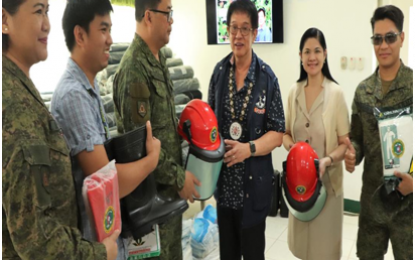<p><strong>ANTI-DENGUE PROTECTION FOR SOLDIERS.</strong> Department of Health (DOH)-CALABARZON Regional Director Dr. Eduardo C. Janairo (3rd from right) leads the turn-over of a set of personal protective equipment, among other anti-dengue kits and vector-control supplies worth PHP1.5 million, to the 2nd Infantry Division (2ID) Army Station Hospital (2ASH) through its commanding officer Col. Armando P. Lacanilao (3rd from left) in Camp Gen. Mateo Capinpin, Tanay, Rizal on Tuesday (July 2, 2019). Joining Janairo during the turn-over rite are Regional Communicable Disease Control Cluster Head Dr. Mara Elena C. Gonzales (2nd from right) and Regional Dengue Prevention and Control Program Coordinator Jomell V. Mojica (2nd from left). <em>(Photo courtesy of DOH4A)</em></p>