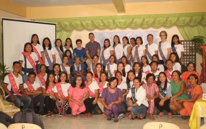 <p><strong>‘INABEL’</strong>. The graduates wear their ‘abel sablay’ with a National Living Treasure Magdalena Gamayo and program director Dr. Edwin Antonio. A short-term course on abel (cloth) weaving is being offered in Pinili town to keep the local weaving industry alive.<em> (Photo courtesy of Edwin Antonio)</em></p>
<p><em> </em></p>