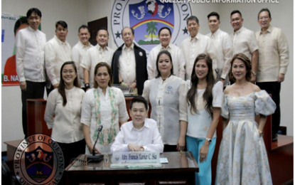 <p><strong>PACIFIC POLICY PROGRAM</strong>. Quezon Governor Danilo Suarez (center) joins newly-elected and reelected Provincial Board Members during a photo opportunity at the first regular session of the provincial legislative council at the Provincial Capitol Session Hall in Lucena City, Quezon on July 1, 2019. Suarez administration aims to implement the Pacific Policy Program to boost development Quezon’s eastern Pacific seaboard towns and geographically isolated areas. <em>(Photo courtesy of Quezon PIO)</em></p>