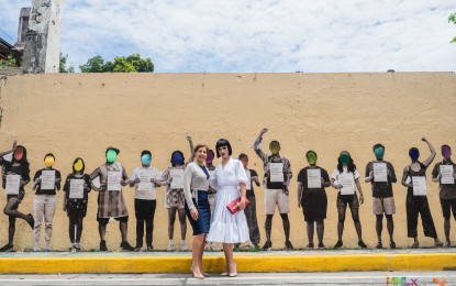 <p><strong>PAINTED WITH PRIDE. </strong>Austrian Ambassador Bita Rasoulian and Austrian drag queen Tamara Mascara during the MNLxVIE Equality Fest 2019 and unveiling of the public mural in Intramuros. The event is in celebration of the LGBT Pride Month last June. </p>