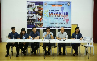 <p><strong>DISASTER PREPAREDNESS.</strong> The city government of San Fernando, led by Mayor Edwin Santiago (third from right), Vice Mayor Jimmy Lazatin (second from right) and members of the City Disaster Risk Reduction and Management Council, discuss the month-long disaster preparedness activities in a press conference held at the city's Heroes Hall Amphitheatre on Thursday (July 4, 2019).  The acivities are in line with the celebration of the National Disaster Resilience Month 2019.<em> (Photo courtesy of the City Government of San Fernando)</em></p>