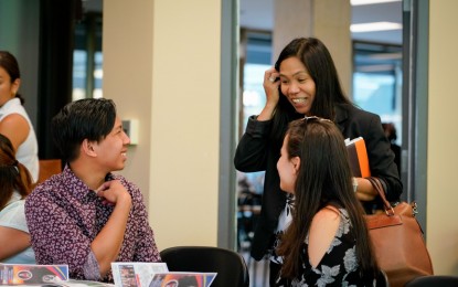 <p><strong>RAISING THE DISCOURSE.</strong> Filipino-American students Roderick Perez (left) and Carsyn Fisher (right) share a light moment before a discussion on tribal leaders’ stories of struggle amid threats posed by the CPP-NPA, in Fordham University on Wednesday (July 3, 2019). They expressed commitment to engage Filipino-American youth organizations on the plight of indigenous people’s communities in the Philippines. <em>(Photo by Mac Villarino/PCOO)</em></p>