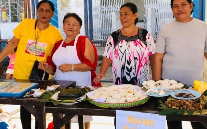 <p><strong>NATIVE DELICACIES.</strong> Mothers of Can-avid, Eastern Samar show their best tasting native delicacies during 4th Karan-un Festival in their town on Sunday (July 7, 2019). The town has been holding this annual event to promote its native delicacies in support to culinary tourism. <em>(Photo courtesy of Baste Pomarejos)</em></p>