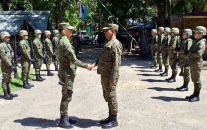 <p><strong>VISIT.</strong> Officers of the 94th Infantry Battalion led by Lt. Col. Randy Pagunuran welcome Brig. Gen. Benedict Arevalo (left), commander of the Army’s 303rd Infantry Brigade based in Murcia, Negros Occidental, during the visit of the latter to the unit’s headquarters in Guihulngan City, Negros Oriental on Sunday (July 7, 2019). The 94IB was placed under the jurisdiction of the 303IBde on July 1, following the realignment of the military forces in Negros Island.<em> (Photo courtesy of 303rd Infantry Brigade, Philippine Army)</em></p>