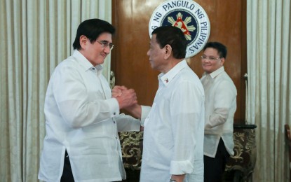 <p>Department of Information and Communications Technology Secretary Gregorio Honasan II and President Rodrigo R. Duterte<em> (Presidential Photo)</em></p>