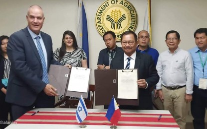 <p><strong>AGRICULTURAL COOPERATION.</strong> Agriculture Secretary Emmanuel Piñol and Israel Ambassador to the Philippines Rafael Harpaz on Tuesday (July 9, 2019) signed the Implementing Agreement on Agricultural Cooperation in the DA Central Office in Quezon City. The grant seeks to introduce modern farming technologies to local farmers. <em>(Photo courtesy of the Department of Agriculture)</em></p>