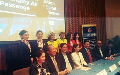 <p><strong>PLEDGE OF COMMITMENT. </strong>Airline executives sign a "pledge of commitment to support NAIA decongestion, develop Sangley Airport, and improve passenger convenience" at the Philippine International Convention Center (PICC) in Pasay City on June 26, 2019.  Also in the photo are Tourism Secretary Bernadette Romulo-Puyat (seated left) and Transportation Secretary Arthur Tugade (seated 2nd from left). <em>(Photo by Cristina Arayata)</em></p>