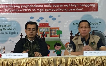 <p>Manila Mayor Isko Moreno Domagoso (left) and Health Secretary Francisco Duque III (right) during the press briefing at the Ramon Magsaysay High School on Tuesday (July 16, 2019). <em>(PNA photo by Ma. Teresa Montemayor)</em></p>