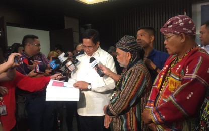 <p><strong>SALUGPONGAN FINDINGS.</strong> National Security Adviser Secretary Hermogenes Esperon showed the media and tribal leaders the document containing the findings on the 55 Salugpongan schools in Davao Region. Esperon was among the Cabinet secretaries present during the last leg of 2019 Pre-SONA held in Davao City on Wednesday. <em>(Photo by Che Palicte)</em></p>