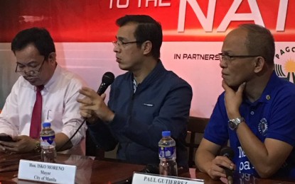 <p>Manila Manila Francisco "Isko Moreno" (middle) Domagoso during a press conference.</p>