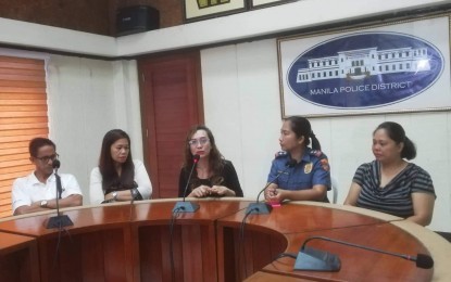 <p><strong>CRY FOR HELP. </strong>Relissa Santos (middle) speaks on behalf of other parents about the ordeal they are experiencing after their children were recruited by communist-linked groups in a press conference at the Manila Police District (MPD) on Friday (July 19, 2019). The MPD has assured prompt action on the complaints of the group. <em>(PNA photo by Benjamin Pulta)</em></p>