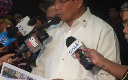 <p><strong>SALUGPONGAN CONTROVERSY.</strong> National Security Adviser Hermogenes Esperon Jr. shows to the media the report detailing the alleged links of Salugpongan schools to the communist rebel movement during an interview with Davao City reporters on Wednesday. <em>(Photo by Che Palicte)</em></p>