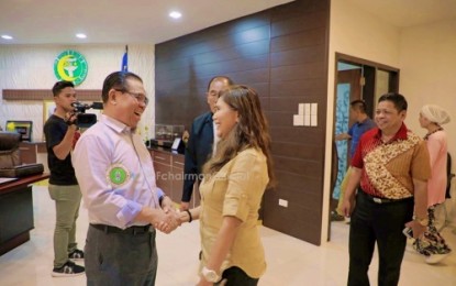 <p><strong>CATAMCO MEETS EBRAHIM.</strong> Bangsamoro Autonomous Region in Muslim Mindanao (BARMM) Interim Chief Minister Ahod Ebrahim (left) welcomes North Cotabato Governor Nancy Catamco (right) in his office in Cotabato City on Friday (July 19, 2019.) The two officials discussed the upcoming transfer of 63 barangays in North Cotabato to the BARMM jurisdiction. <em>(Photo courtesy of the Office of the BARMM Chief Minister)</em></p>