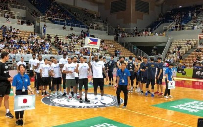 <p><strong>JONES CUP CHAMPION.</strong> Triumphant Mighty Sports-Go For Gold Philippines attends the closing ceremony the Jones Cup at the Xinzhuang Gym in New Taipei City, Taiwan on Sunday (July 21, 2019).  The Philippines completed an 8-game sweep of its sixth title since the tournament began in 1977 after beating host Taiwan-B, 81-71, on Sunday. <em>(contributed photo)</em></p>