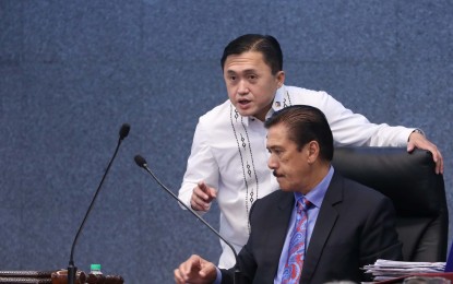 <p>Senator Bong Go (standing) and Senate President Vicente Sotto III <em>(File photo)</em></p>