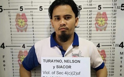 <p><strong>ONLINE EXPLOITATION OF CHILDREN.</strong> Nelson Siacor Turayno, 32, of Barangay Luz, Cebu City, poses for a mugshot before booking of his detention at the Cebu City Jail after his arrest last April by joint operatives of the National Bureau of Investigation–Anti-Human Trafficking Division and the Philippine National Police–Women and Children Protection Center. Turayno has been considered by the European Union Agency for Law Enforcement Cooperation as “most wanted criminal” for producing and distributing child sexual exploitation materials (CSEM) on the “dark web.” <em>(Photo courtesy of Women and Children Protection Center–Visayas Field Unit)</em></p>
