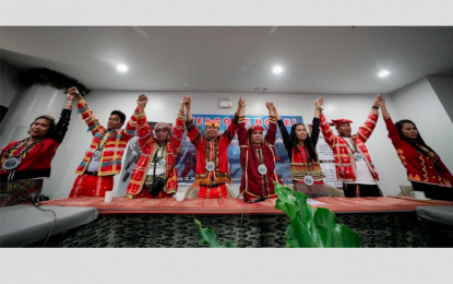 <p><strong>‘AMBASSADORS OF TRUTH.’</strong> Tribal leaders raise each other’s hands in a press briefing in Pasay City on Thursday (July 25, 2019). They vow to continue to defend their communities against intimidations and harassments posed by the CPP-NPA. <em>(PCOO photo by Mac Villarino)</em></p>