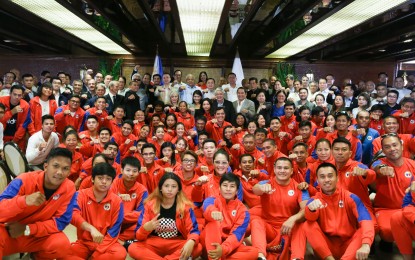 <p>President Rodrigo Duterte with sports officials and national athletes at Malacañan Palace in 2019 <em>(Presidential photo)</em></p>
