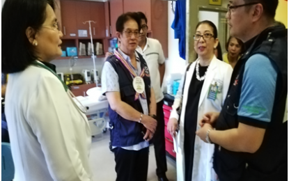 <p><strong>FAST LANE.</strong> New Sinai MDI Hospital chief of pediatrics, Dr. Rizalina Gonzales <em>(far left)</em>, and Hospital Administrator, Dr. Wilhelmina Lopez, brief Health Undersecretary Enrique Domingo <em>(far right)</em> and Department of Health 4-A (Calabarzon) Director Eduardo C. Janairo (center) during their visit to the hospital in Sta. Rosa City, Laguna on Thursday (July 25, 2019). Health officials have put all hospitals in affected areas on alert in view of an outbreak of dengue. <em>(Photo by Saul E. Pa-a)</em></p>