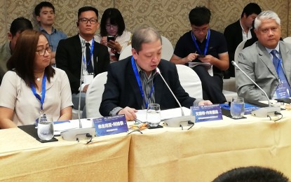 <p>National Committee on Cinema executive committee member Vicente Nebrida (middle) during Friday's Belt and Road Initiatve China-Philippines Forum in Pasay City. <em> </em>Also in the photo is PCOO-News and Information Bureau director Virginia Arcilla-Agtay (left)<em>. (PNA photo by Ma. Teresa Montemayor) </em></p>
