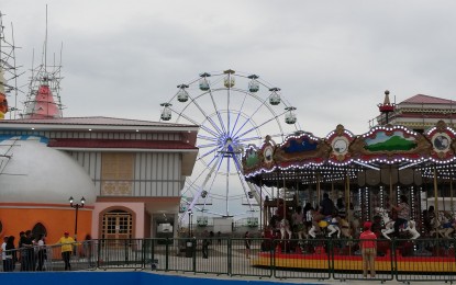 <p><strong>THEME PARK.</strong> The 25-meter high Ferris wheel dubbed the Silay Eye (center) is one of the attractions at the Magikland, the first outdoor theme park in the Visayas located in Silay City, Negros Occidental. The uniquely Negrense entertainment destination is scheduled to open in October this year. <em>(Photo by Nanette L. Guadalquiver)</em></p>